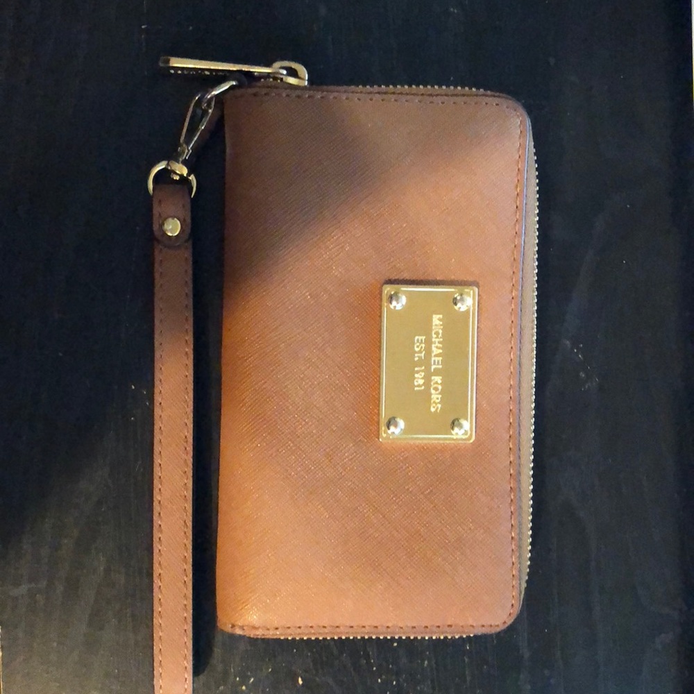Medium brown MK wallet. Gold detailing